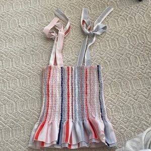 Cutest dressy shirt that is fitted but ruffles on the end!